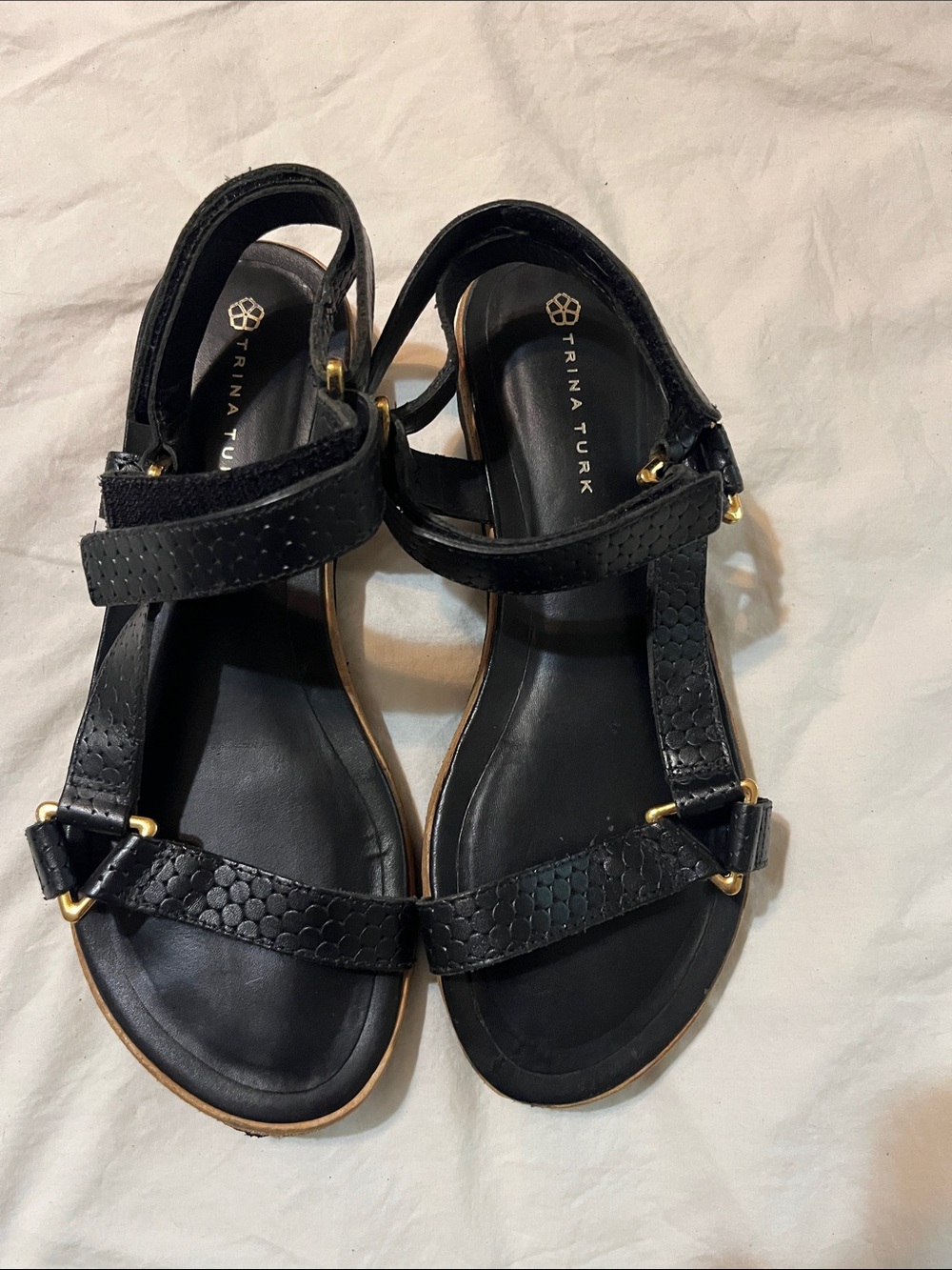 Trina Turk Black Textured Leather Strap Sandals with Gold Accents